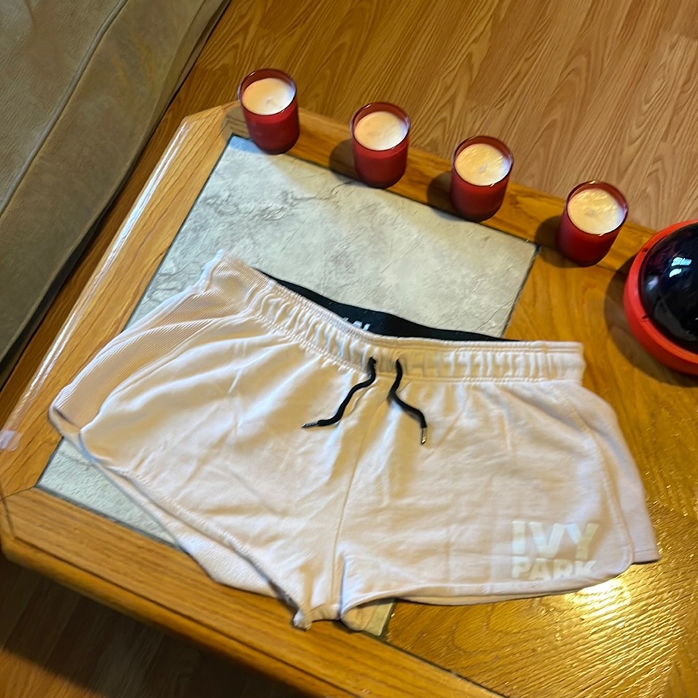 Woman’s wide band large Ivy park draw string shorts pink white and black